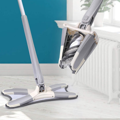 X-Mop with washable and replaceable fibre heads, hand free squeezing and Wringing
